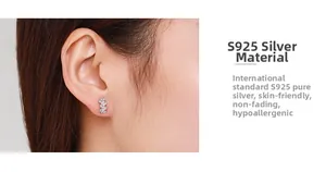 Detail of S925 sterling silver geometric stud earring shown on model with material specs