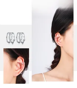 Detail of S925 sterling silver ear cuff with double layers and paved cubic zirconia