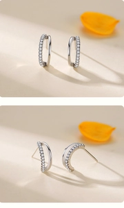 Detailed view of S925 silver double-layered C-shaped stud earrings with pavé zircons