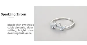 Detailed view of crown ring with pear-cut cubic zirconia in prong setting