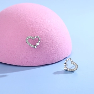 Elegant S925 silver heart stud earrings with sparkling pavé crystals and polished beads