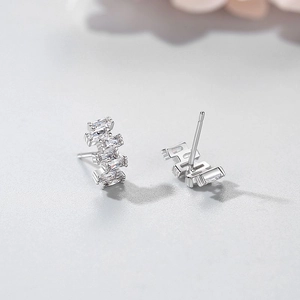 Elegant S925 silver stud earrings with asymmetrical baguette-cut cubic zirconia crystals