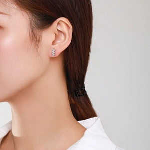 Minimalist S925 sterling silver sugar cube stud earrings with pavé diamonds on model