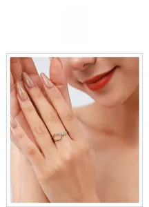Detail showing elegant 925 sterling silver leaf ring with sparkling zircons on model hand