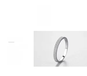 Close-up of S925 sterling silver eternity band with micro-pave cubic zirconia stones