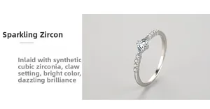 Close-up of geometric 925 silver ring featuring claw-set triangular cubic zirconia