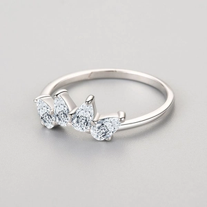 Elegant S925 sterling silver crown ring featuring four pear-cut cubic zirconia stones