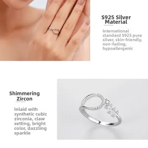 Detail of 925 sterling silver leaf ring with cubic zirconia in prong setting