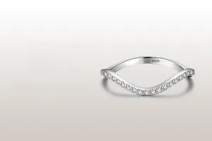 Macro detail of S925 sterling silver wave ring with micro-pave white zircon stones