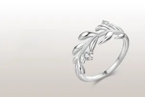 Macro detail of leaf-shaped S925 sterling silver ring with cubic zirconia stones