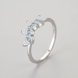 Elegant S925 sterling silver crown ring featuring four pear-cut sparkling cubic zirconia