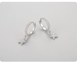 Close-up of S925 sterling silver star hoop earrings with micro-pave cubic zirconia crystals