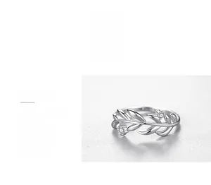 Macro detail of leaf ring showing polished S925 sterling silver and inset cubic zirconia