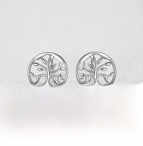 Detailed view of sterling silver tree of life stud earrings with zircon stone accents