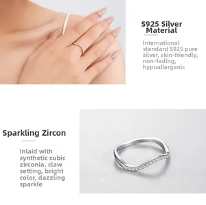 Macro view of S925 sterling silver wave ring with micro-pave cubic zirconia settings