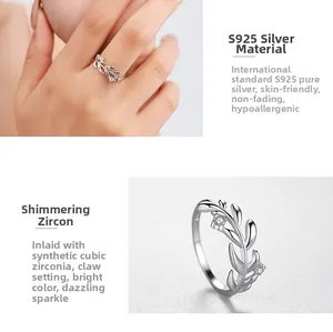 Detailed view of S925 sterling silver leaf ring with zircon accents on a model hand