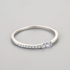 Minimalist 925 sterling silver ring with baguette-cut crystal and micro-pave setting