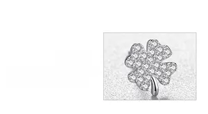 Macro shot of silver four-leaf clover stud earrings with pavé-set sparkling zircons