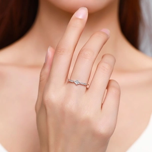925 sterling silver geometric ring featuring a square-cut diamond on model's finger