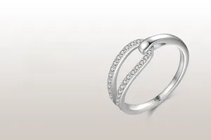 Close-up of S925 sterling silver crisscross ring featuring micro-paved cubic zirconia
