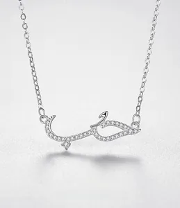 Macro shot of S925 silver Hubb Arabic calligraphy pendant with shimmering cubic zirconia