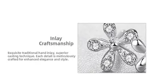 Macro shot of S925 sterling silver daisy earrings with micro-set cubic zirconia petals