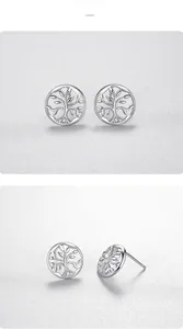 Detailed macro view of S925 sterling silver Tree of Life earrings with micro-inlaid zircon