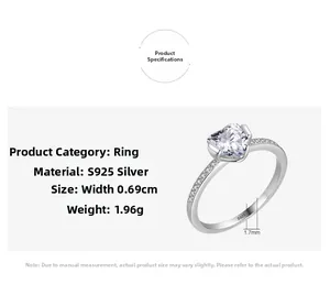 Macro detail of S925 sterling silver ring with heart-shaped diamond and measurements