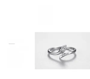Macro detail of S925 sterling silver snake ring with pavé cubic zirconia accents