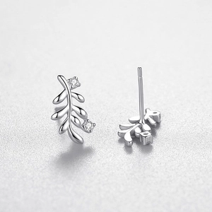 S925 sterling silver leaf stud earrings with sparkling cubic zirconia on gray background