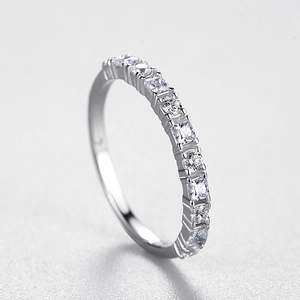 Minimalist s925 silver ring featuring half-circle pavé crystals and modern stacked design