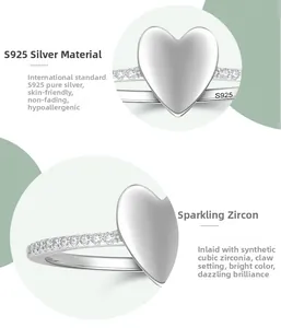 Macro detail of S925 sterling silver heart ring featuring cubic zirconia claw setting