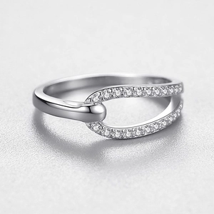Polished S925 sterling silver geometric ring with shimmering pave-set cubic zirconia accents