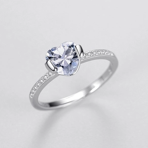 Elegant S925 silver ring featuring heart-shaped carbon diamond and shimmering pavé band