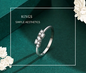 Macro detail of S925 sterling silver ring featuring geometric zircon stones and slim band