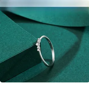 Macro detail of S925 sterling silver ring showing V-shaped diamonds and hallmark