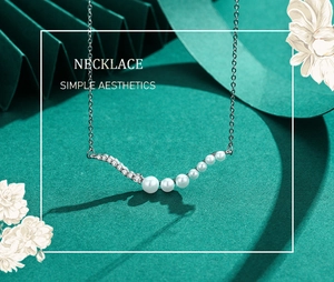 Detailed shot of S925 sterling silver necklace with gradient pearls and sparkling zircon