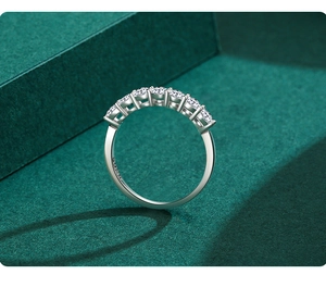 Macro shot of S925 sterling silver ring featuring seven round sparkling zircons