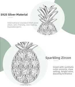 Macro view of S925 sterling silver pineapple studs with cubic zirconia pavé setting