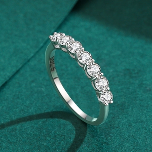 Elegant S925 sterling silver band ring with seven round-cut cubic zirconia stones