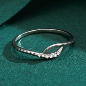 Minimalist S925 sterling silver ring featuring a wave design with sparkling zircon stones