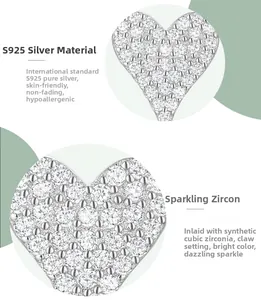Detailed view of S925 sterling silver heart earrings with micro-set cubic zirconia