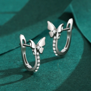 Elegant S925 sterling silver bow earrings with sparkling pavé cubic zirconia accents