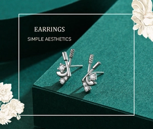 Détail des boucles d'oreilles bâton de hockey en argent S925 avec zircons blancs