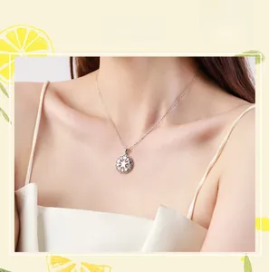 Close-up of S925 sterling silver necklace with hollow star pendant on model neckline
