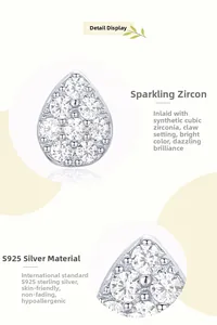 Macro shot of S925 sterling silver water drop earrings with full cubic zirconia stones