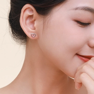 Minimalist S925 sterling silver hollow heart stud earrings with small zircon for women