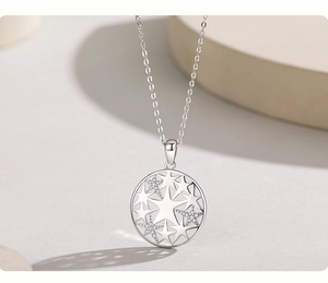 Detail of S925 silver star pendant necklace featuring micro-set crystals and hollow stars