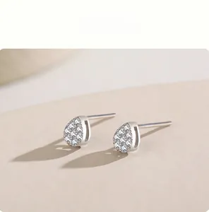 Detailed view of silver water drop stud earrings featuring micro-pave cubic zirconia stones