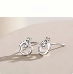 Close-up of S925 sterling silver earring featuring a vertical bar set with three zircons